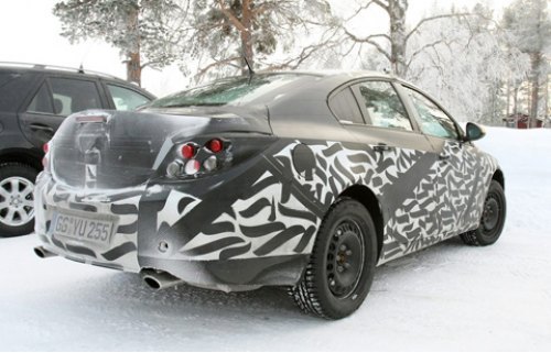 Любопытно, что скрывается под камуфляжем? Действительно ли багажник такой «горбатый», или это всего…