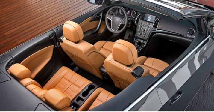 В интерьере — кожа Nappa, вентилируемые сиденья, электропривод, подносящий ремни безопасности ближе…