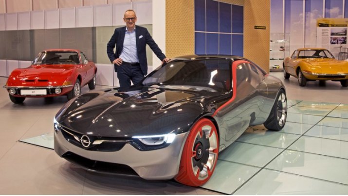 Карл-Томас Нойман (на фото он позирует рядом с концептом Opel GT), вероятно, останется у руля —…