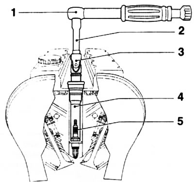 22.4. Unscrewing the spark plug from a deep niche using a special key: 1. Ratchet handle; 2.…