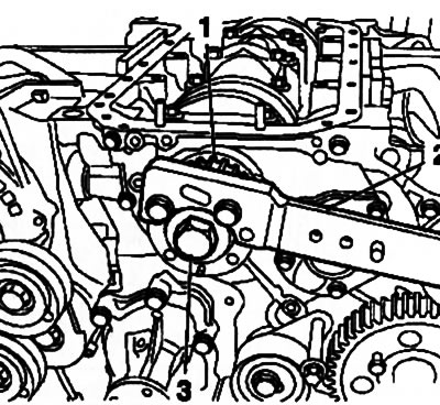 13.17a. Holding the drive wheel (1) from turning using the KM-662-C tool (2), unscrew the mounting…