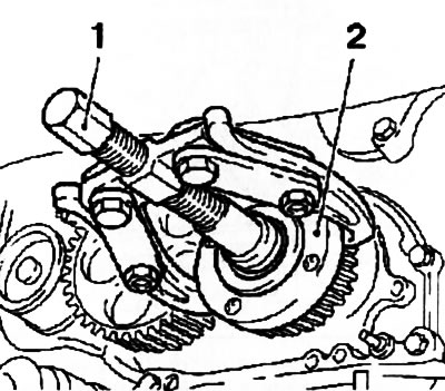 13.17b. Removing the timing drive pinion (2) using the KM-161-B tool (z17DTH engine)