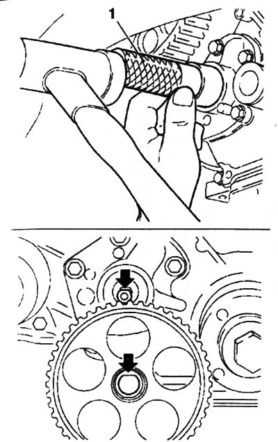 13.34b. Installing the oil pump gear (the arrows show the position of the edge of the mounting…