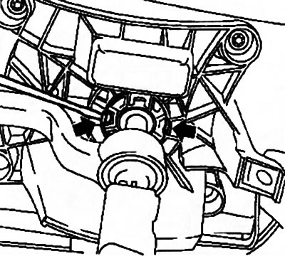 10.3. To remove the gear shift lever, press the locks in the direction indicated by the arrows