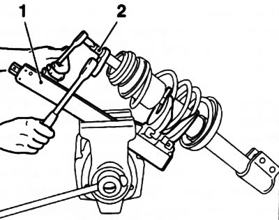 3.2. Devices for compressing the coil spring (1) and for releasing the support bearing fastening…