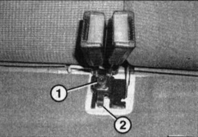 53.2. Screw (1) for fastening the rear seat belt buckle assembly (corsa C models): 2. Thrust bracket