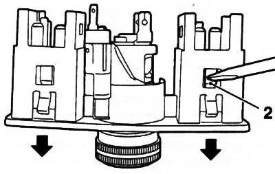 27.5. Press the lock (2) down and pull the front seat heating switch in the direction indicated by…