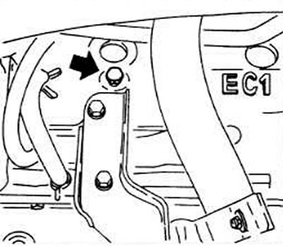 Remove the lower hose on the radiator and drain the coolant.