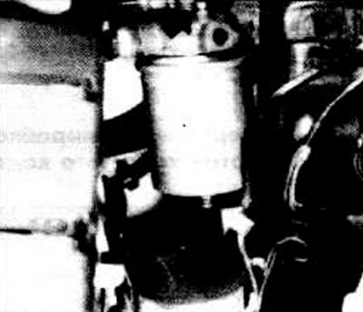 Place a container underneath to collect the sediment.