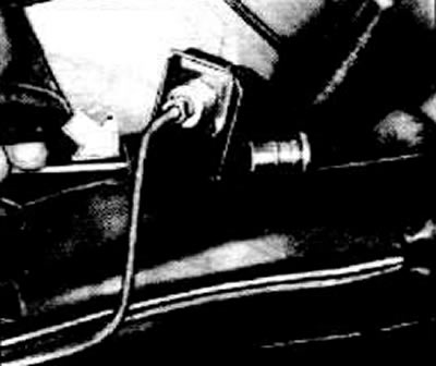 Disconnect the polymer guides from the holders on the gas tank. For Caravan models, remove the…