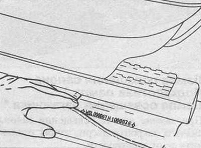 Location of identification number on floor panel