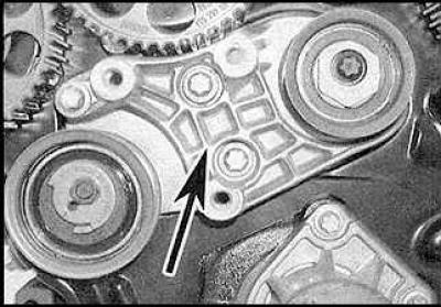 5. Lock the timing belt with a wedge.