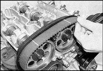6. In engines equipped with a conventional tensioner, the belt must first be placed on the lower…