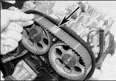 7. On engines equipped with a modified tensioner, the belt must first be placed on the tensioner…
