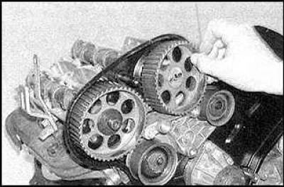 2. Lubricate the cams and bearing journals of the shafts with clean engine oil. Install the…