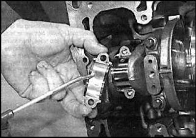 5. Check the alignment of the lower head of the connecting rod with the crankshaft journal and, if…