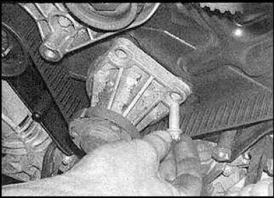 2. Remove the front timing belt cover.