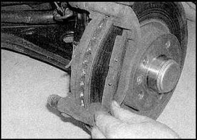 10. Raise the caliper.