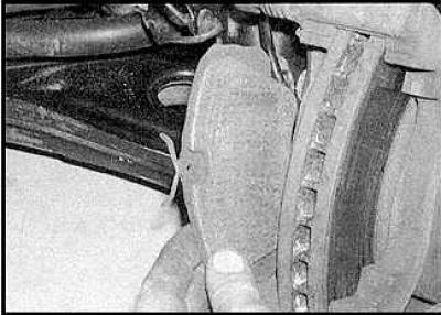 10. Raise the caliper.