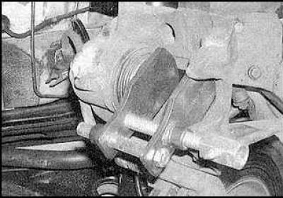 1. Measure the thickness of the brake pads. If any of the brake pads require replacement, all four…