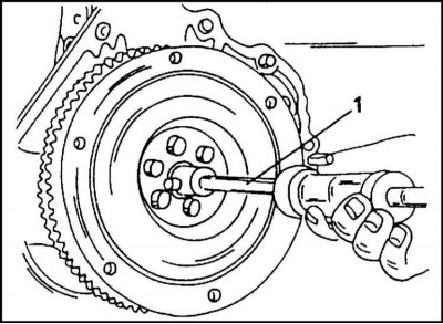 1. The bearing is removed using a puller and a hammer with a sliding striker, see illustration.