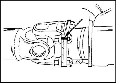 12. Mark both propeller shaft joint flanges with paint as shown and remove the four bolts and nuts…
