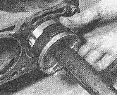 Photo 12.14. Installing the piston into the cylinder block.