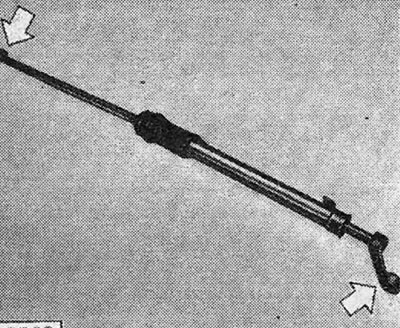 Figure 6.10. Relative position of the intermediate lever and clamp (shown by arrows)