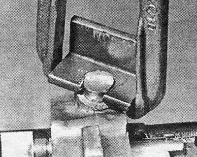 Photo 18.13C. Slide hammer attached to retainer plug extraction tool.