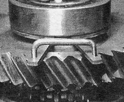 Photo 18.23. Clamp for holding the retaining ring in a compressed position.
