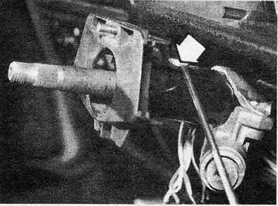Photo 10.4A Remove the steering column switch fuse plugs (indicated by arrows)