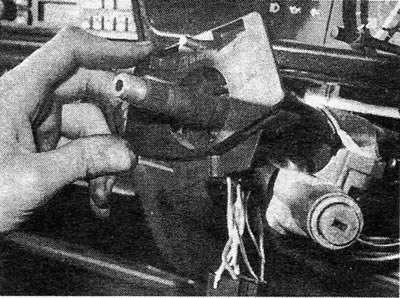 Photo 10.4B....turn the switch assembly counterclockwise and remove it from the column