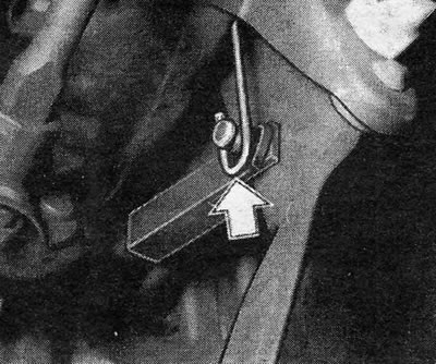 Figure 9.71 — Brake pedal return spring and bracket stud — indicated by arrow
