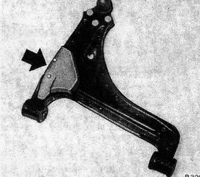 Figure 10.7. Control bracket shock absorber weight - indicated by arrow