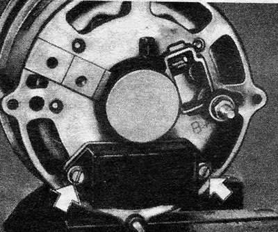 Figure 12.3. Screws securing the brush holder and generator regulator (indicated by arrows) - Bosch…