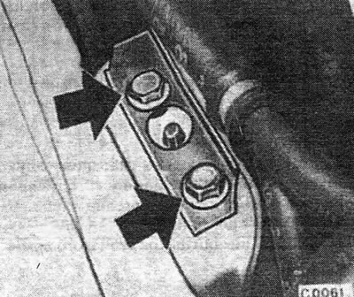 Loosen the water pump mounting bolts.