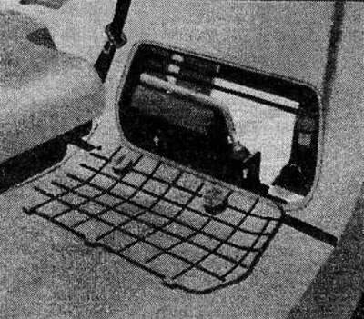 The jack and tools are located behind the cover on the right rear trim of the luggage compartment.