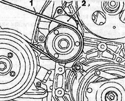 Using a spanner (KM-913-A), turn the belt tensioner roller clockwise by the mounting bolt, then…