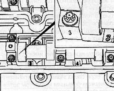 Before removing the camshaft bearing caps, check the caps for markings or mark them.