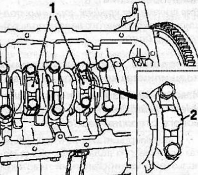 Remove the bolts and the connecting rod caps.