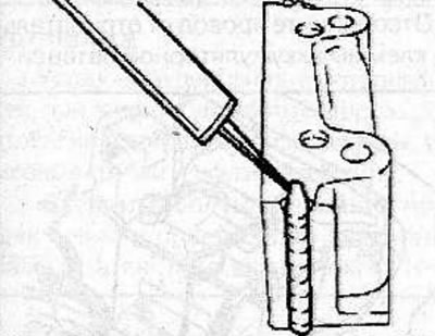 After installing the rear crankshaft main bearing cap, pressurize the side channels of the cap with…