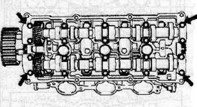 Apply a 2-3 mm diameter layer of sealant to the side walls of the front and rear camshaft bearing…