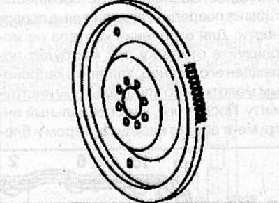 Using a special tool, block the flywheel from turning and unscrew the 8 flywheel mounting bolts.