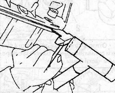 Insert special tool KM-J-37228 between the oil pan and the crankcase. Be careful not to damage the…