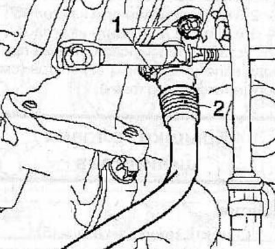 Remove 2 bolts (1), remove gaskets and disconnect engine oil return pipe (2) from turbocharger.