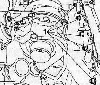 Unscrew 10 nuts (1), remove the exhaust manifold with the turbocharger and remove the gasket.