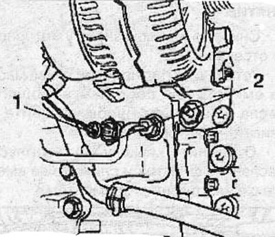 Disconnect the connector (1) from the oil pressure sensor (2), then unscrew the oil pressure sensor…