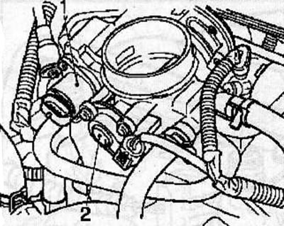 Disconnect the connector from the idle speed control valve (1) located on the throttle body.
