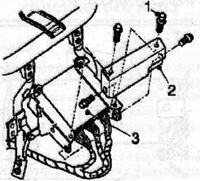Drill out the shear head bolt (1) securing the anti-theft plate (2) to the engine control unit (3),…