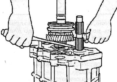 Remove the 5th/Reverse synchronizer sleeve, ring, needle bearing and reverse gear from the main…